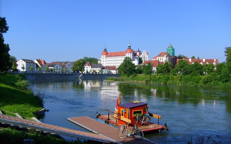 Red Houseboat on River