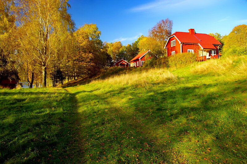 Red Houses on Hillside — Green, Serene