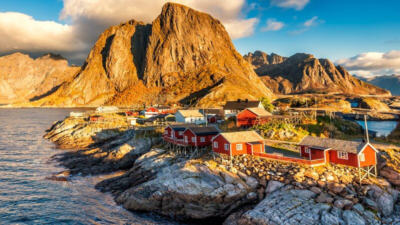 Red Houses on Rocky Coast — Dramatic