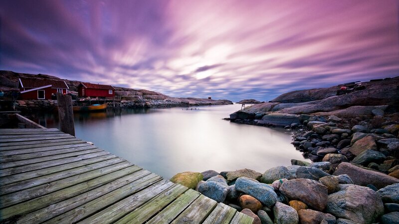 Red Houses on Rocky Shore