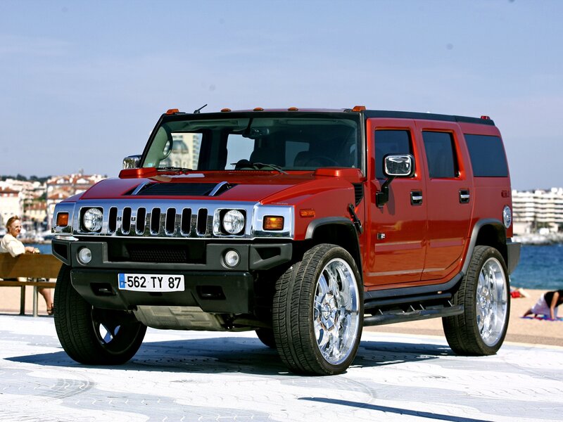 Red Hummer H2 by the beach