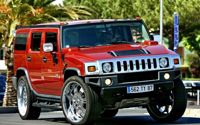 Red Hummer H2 on a sunny day