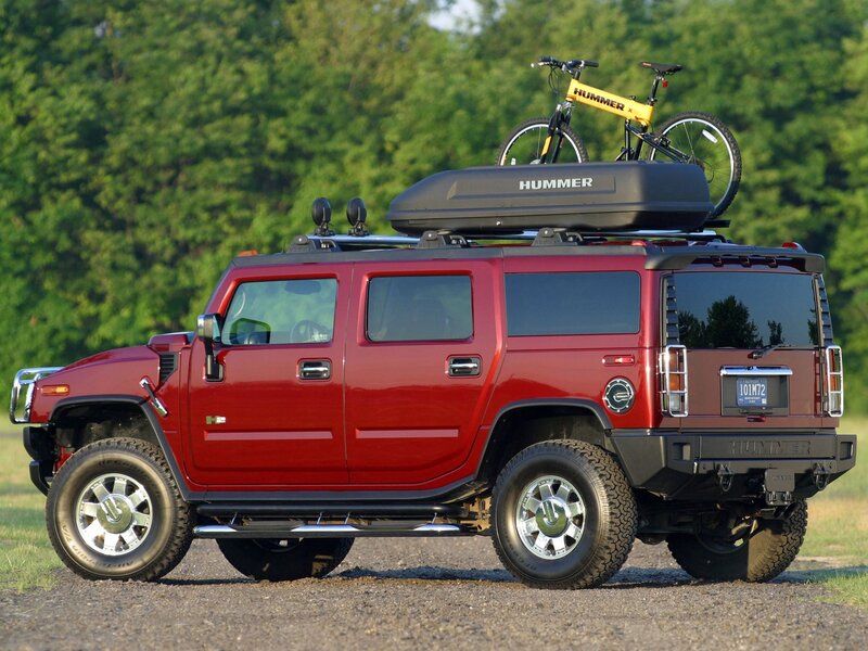 Red Hummer H2 with bike rack