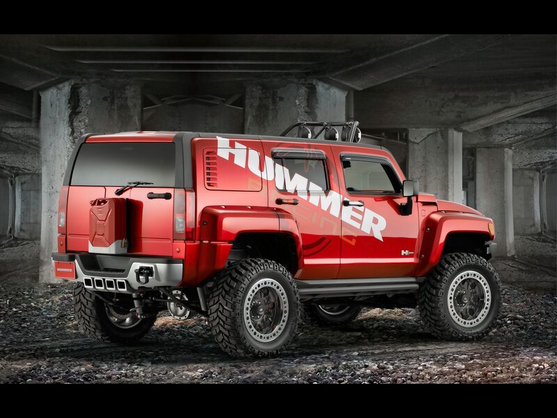 Red Hummer H3 in concrete tunnel