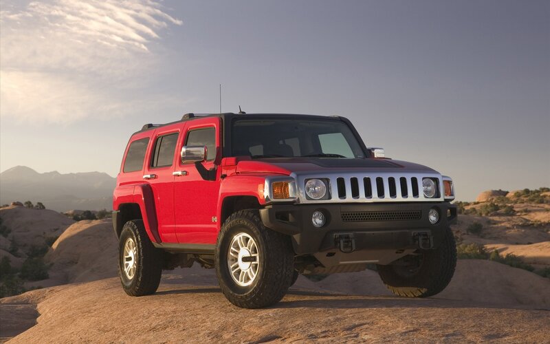 Red Hummer H3 in desert