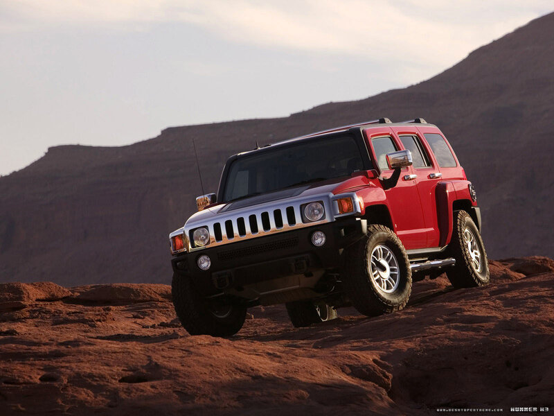 Red Hummer H3 in desert