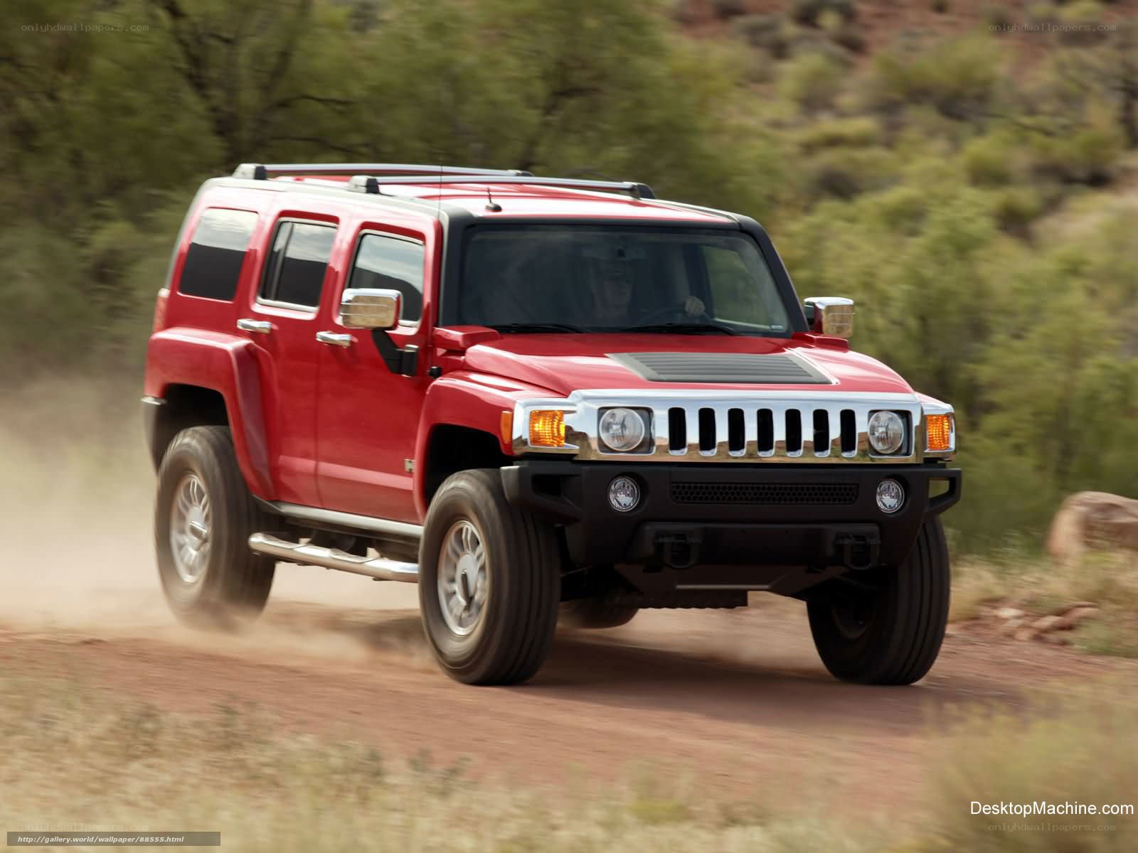 Red Hummer H3 on dirt road