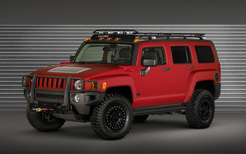 Red Hummer H3 with roof rack