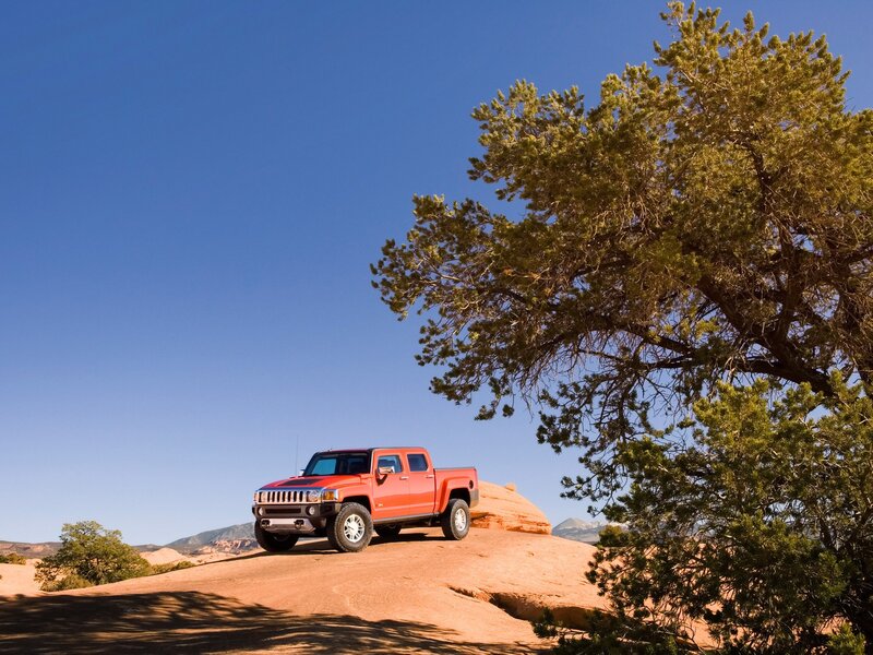 Red Hummer on desert hill