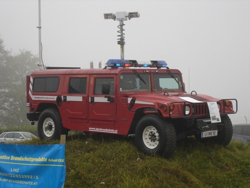 Red Humvee at an event
