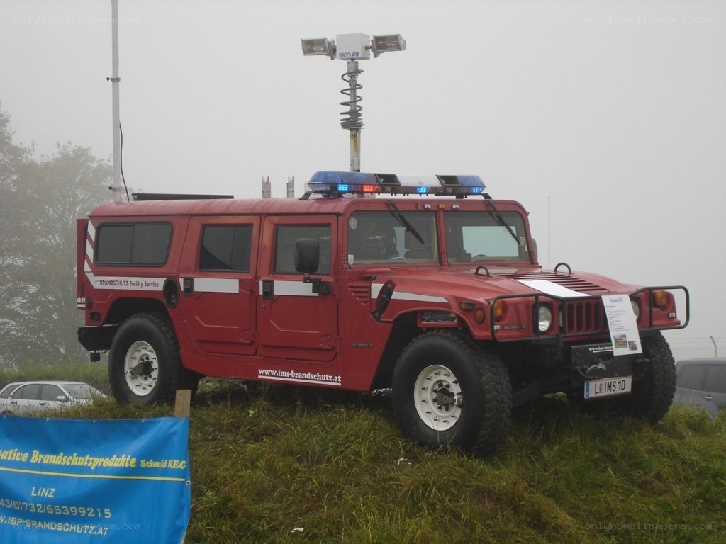 Red Humvee at an event