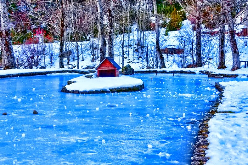 Red Hut on Frozen Pond