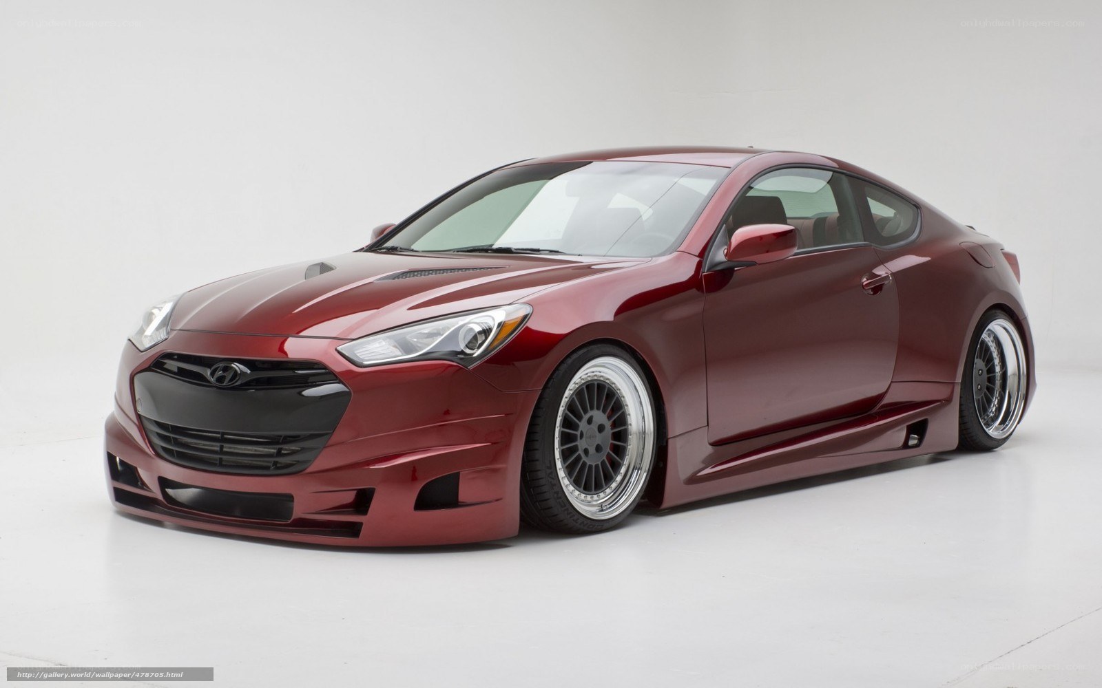red hyundai coupe car