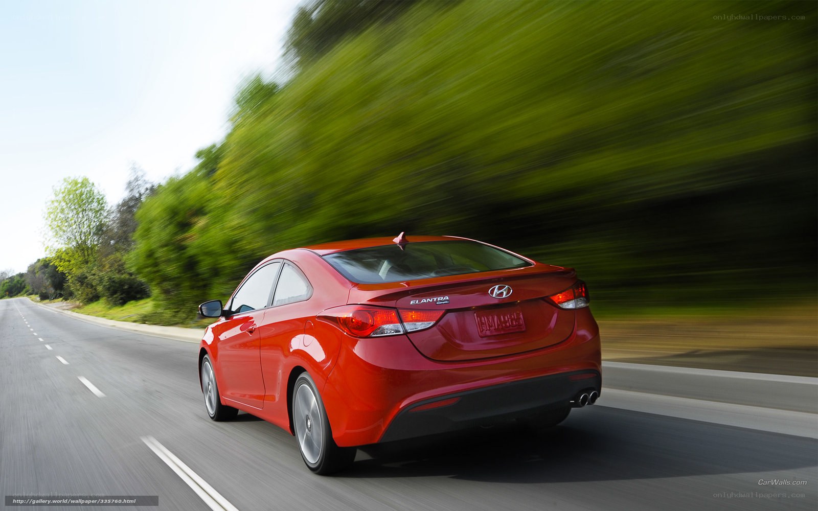 Red Hyundai Elantra in motion