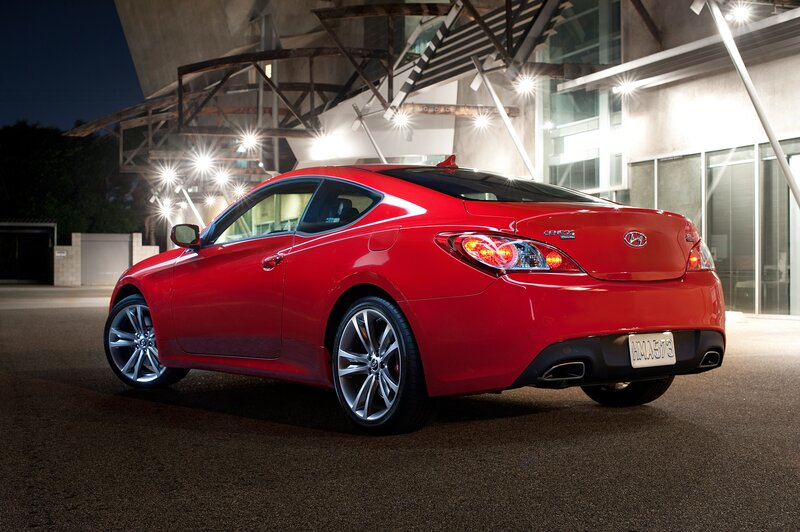Red Hyundai Genesis Coupe at night