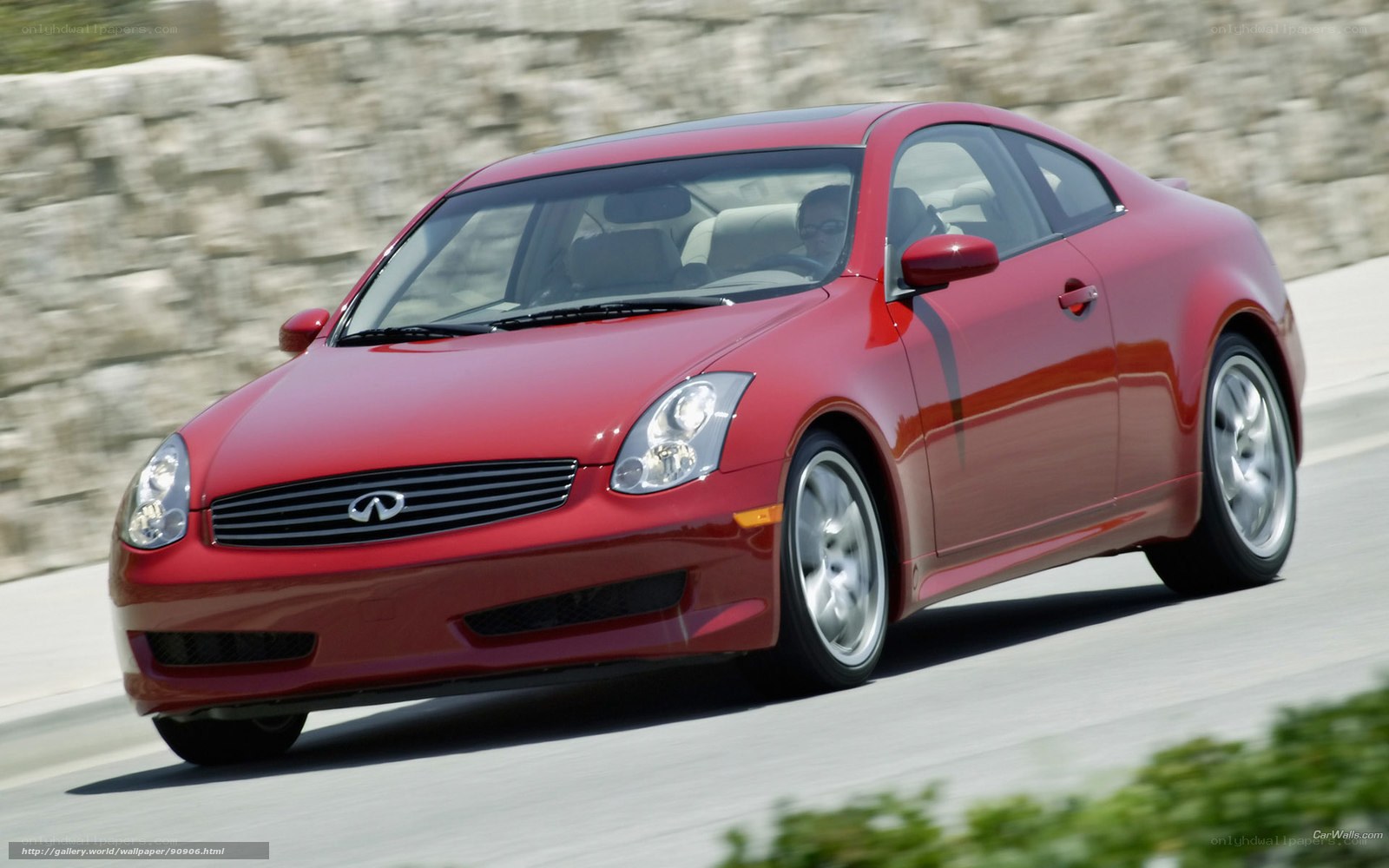 Red Infiniti G35 in motion