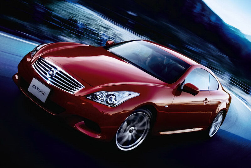 Red Infiniti Skyline in motion