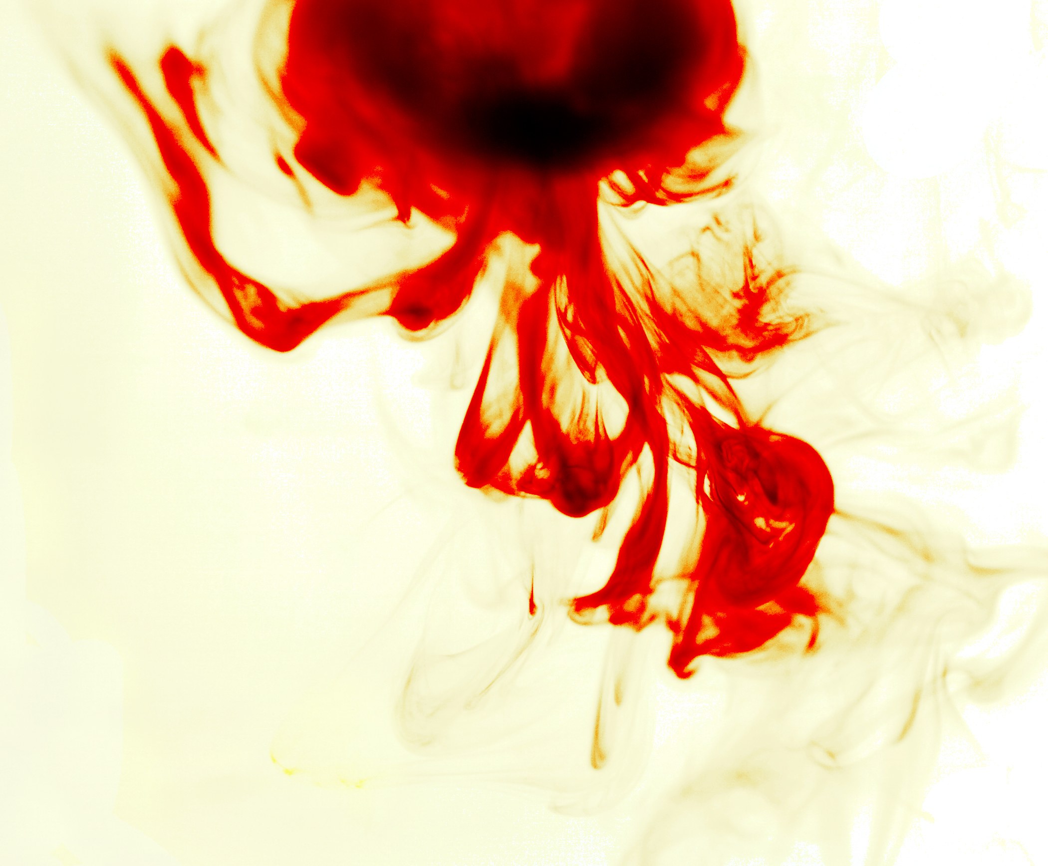 Red ink dispersing in liquid