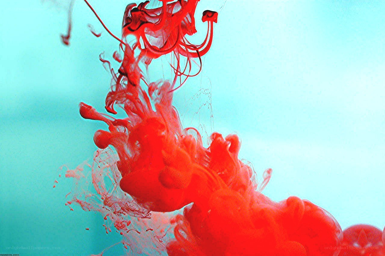 Red ink dispersing in water