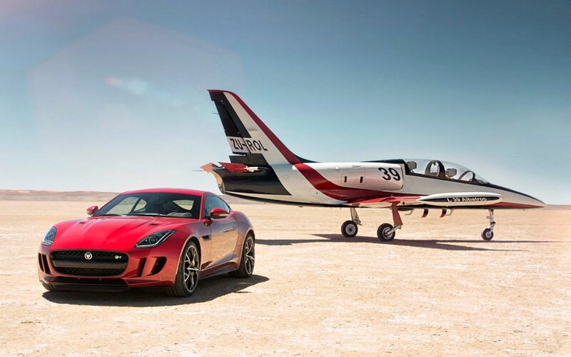 Red Jaguar Car and Jet