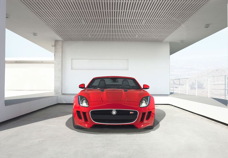 Red Jaguar F-Type in modern garage