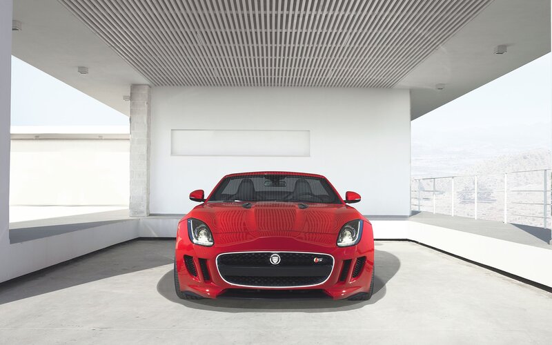 Red Jaguar F-Type in modern garage