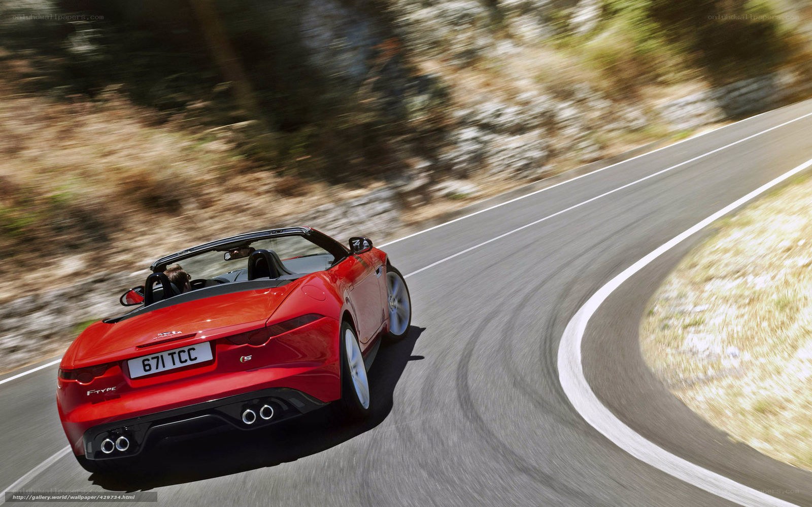 Red Jaguar F-Type S driving