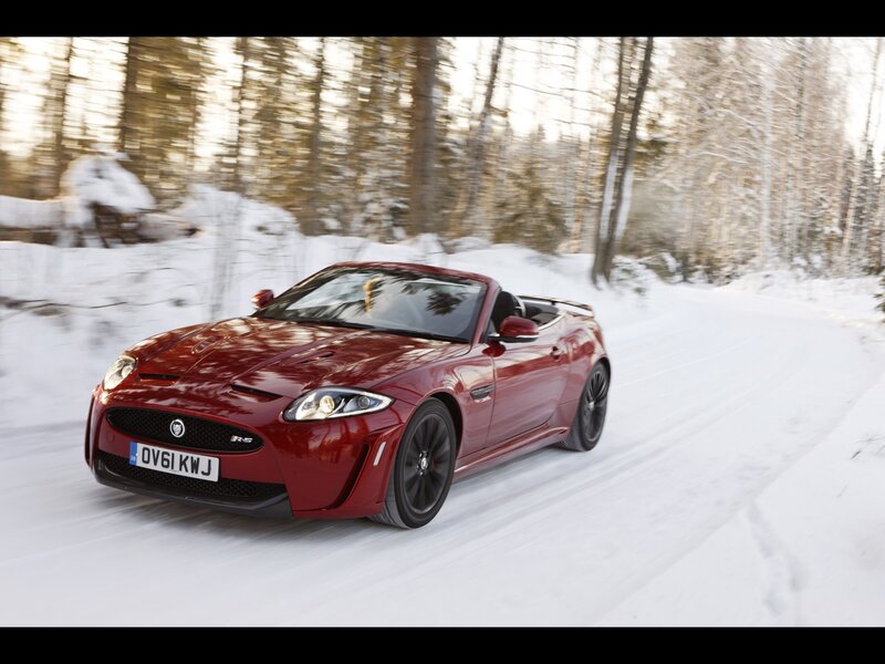 Red Jaguar R-S convertible on snow