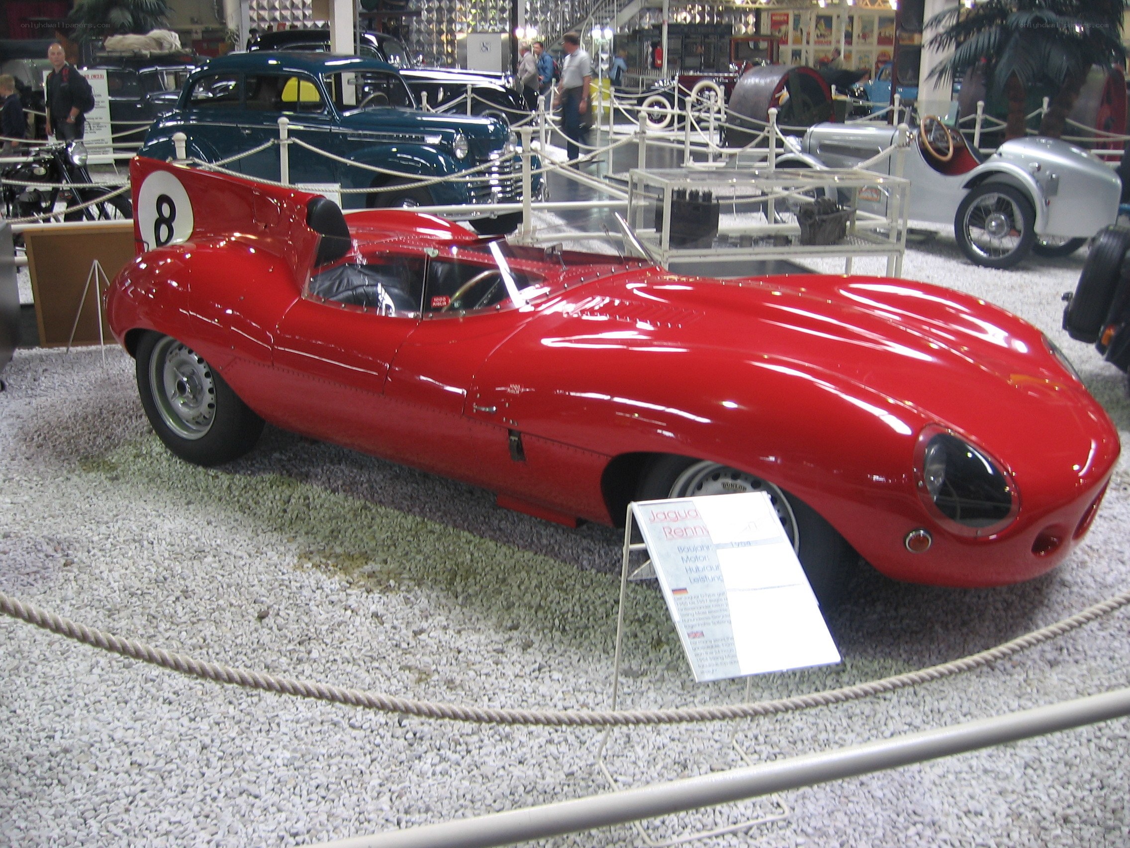 Red Jaguar race car on display