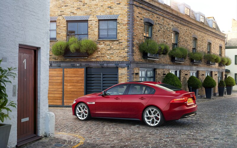 Red Jaguar Sedan — Calm