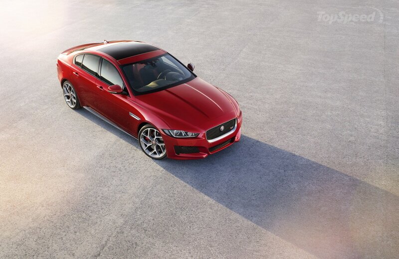 Red Jaguar Sedan — Dramatic, Afternoon