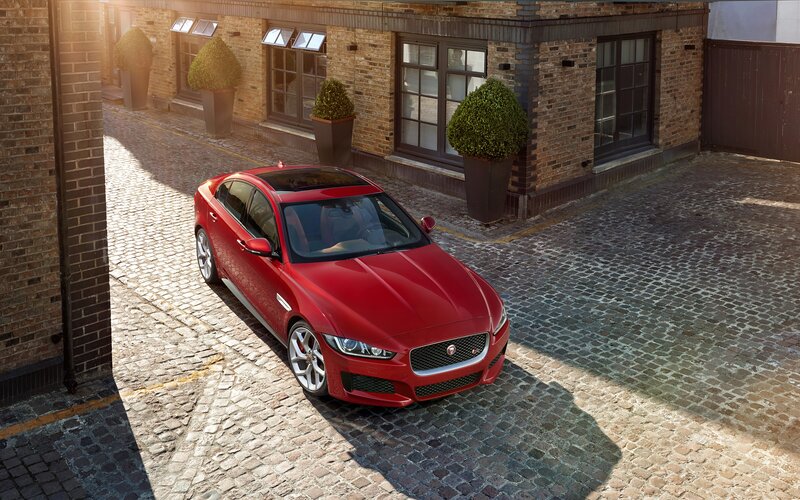 Red Jaguar Sedan — Dramatic