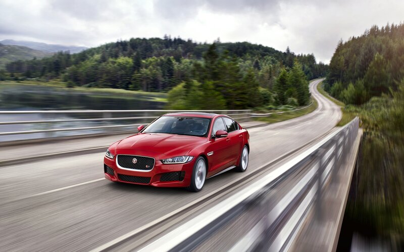Red Jaguar Sedan — Dynamic, Afternoon