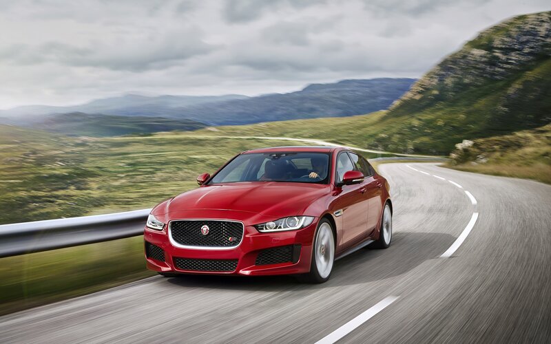 Red Jaguar Sedan — Dynamic