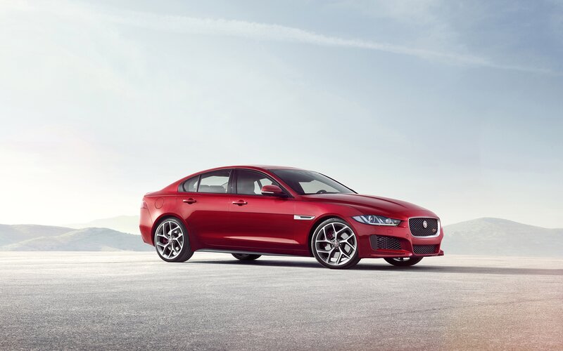 Red Jaguar Sedan — Serene