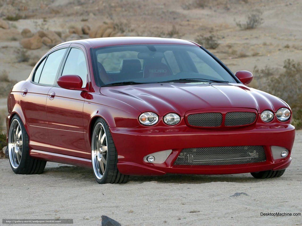Red Jaguar X-Type sedan