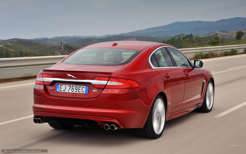 Red Jaguar XF in motion