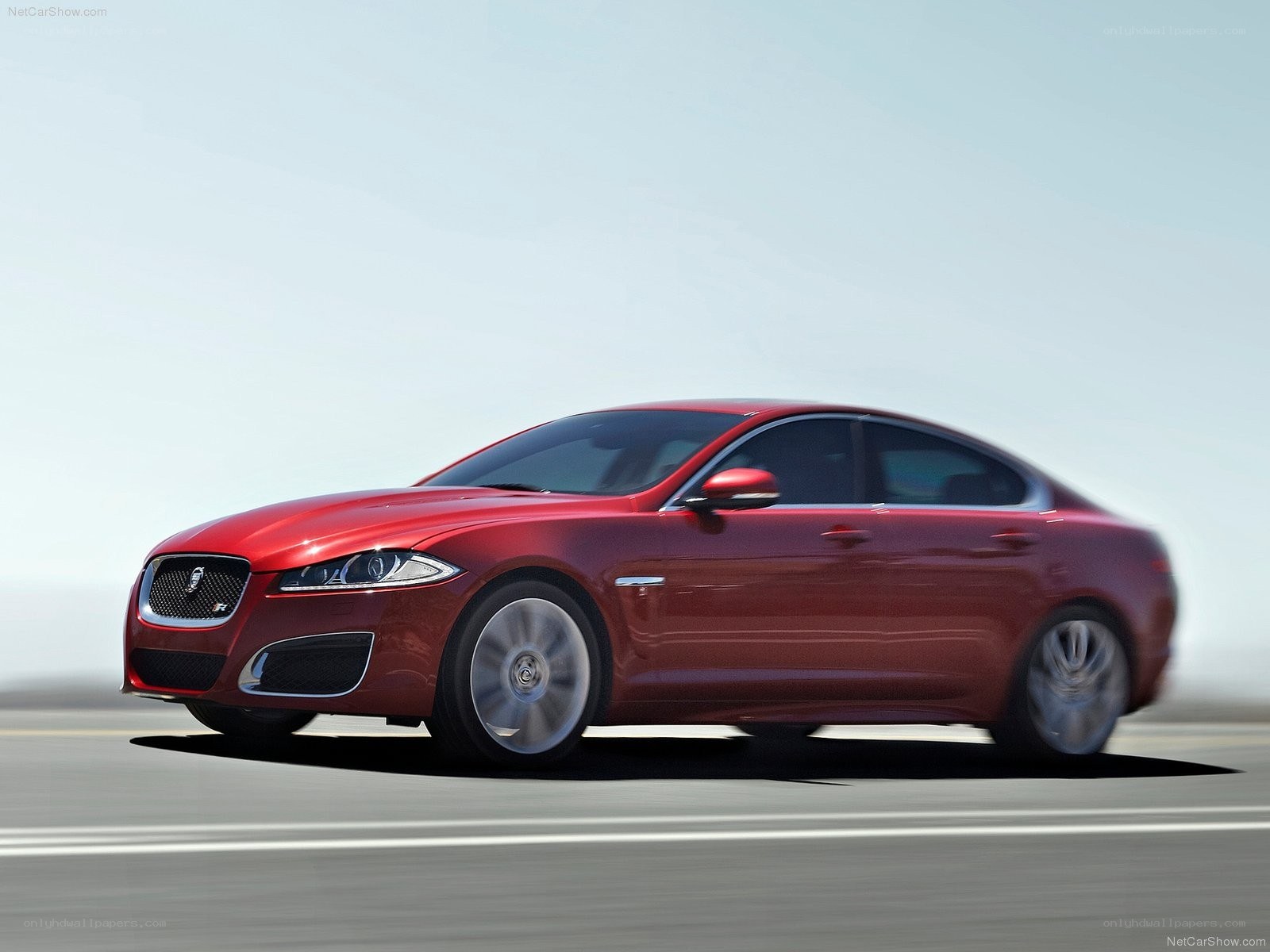 Red Jaguar XFR in motion
