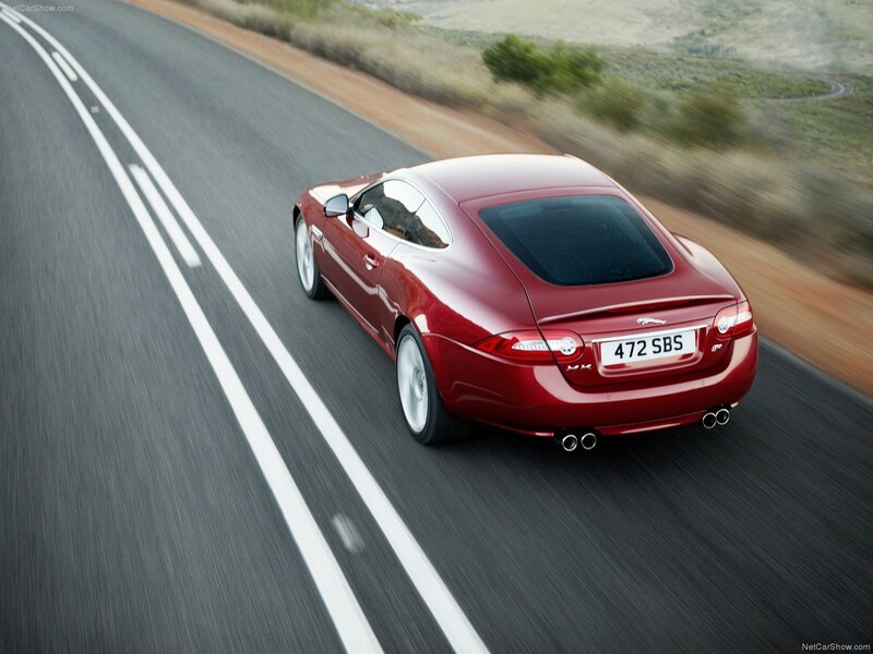 red jaguar xk in motion