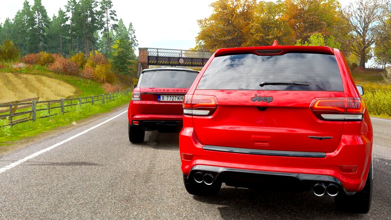 Red Jeep and Range Rover