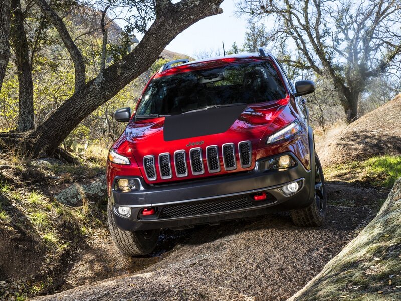 Red Jeep Cherokee on trail