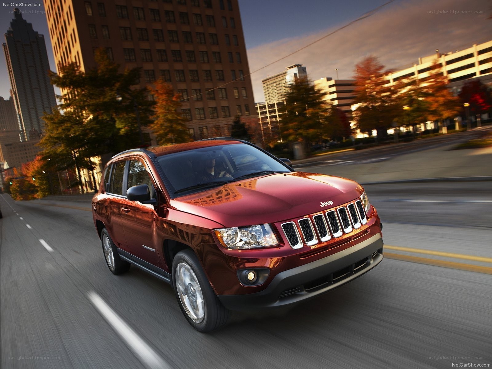 Red Jeep Compass in city