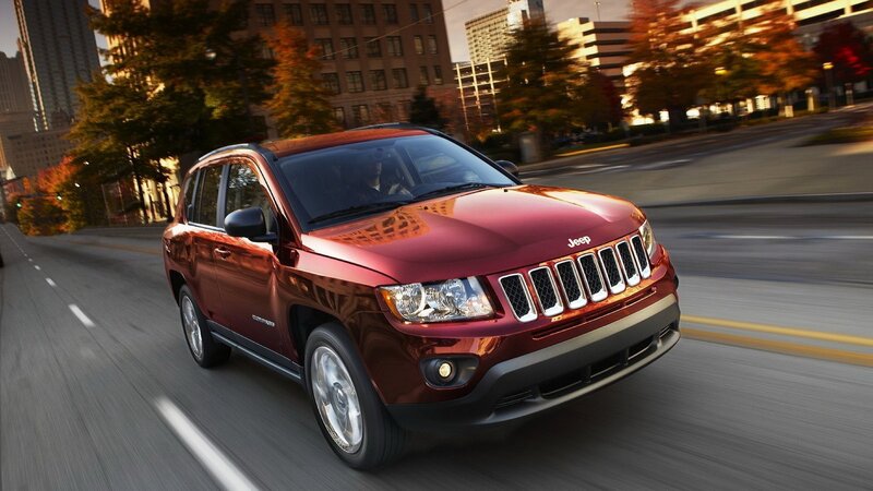 Red Jeep Compass in city