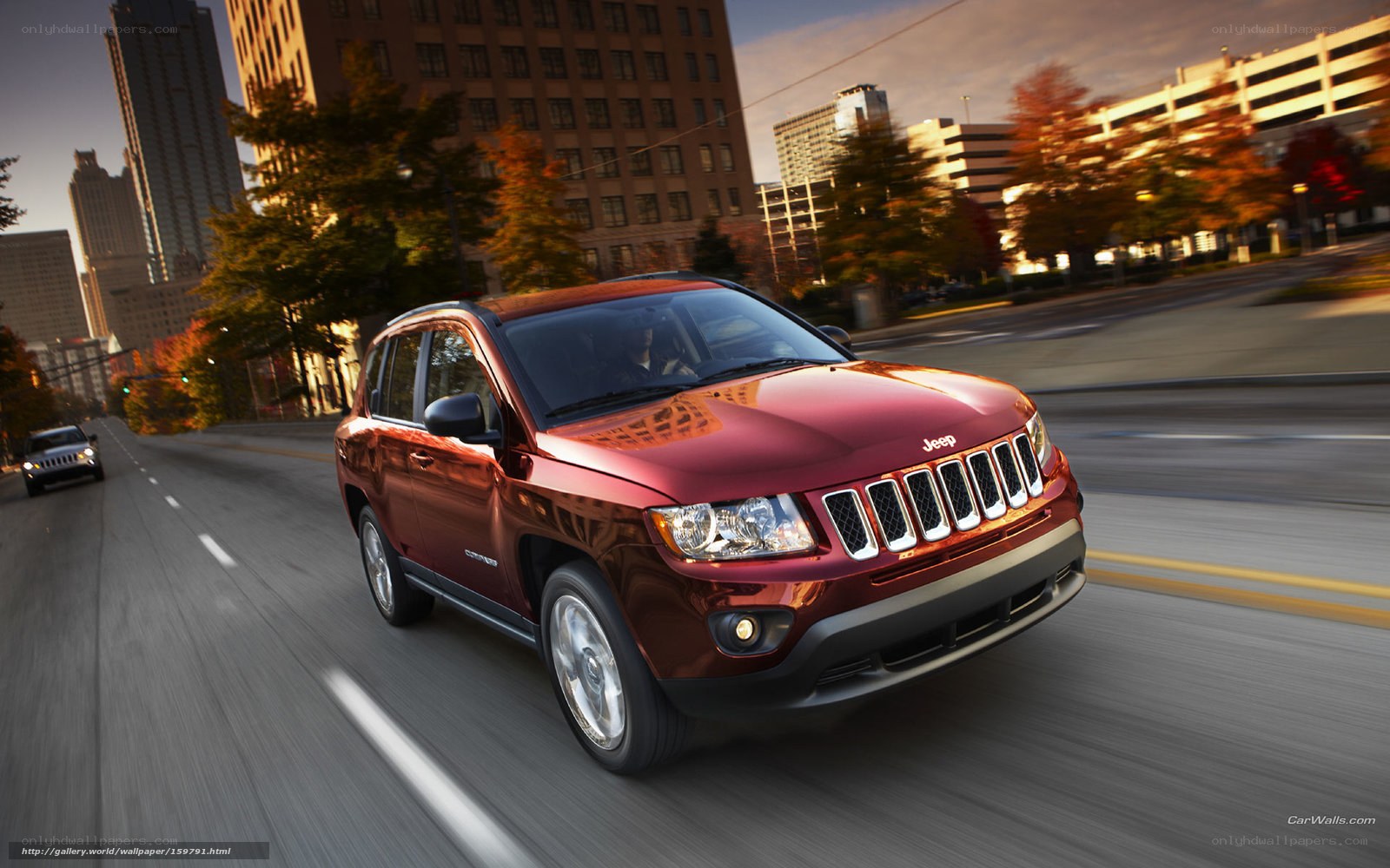 Red Jeep Compass in city