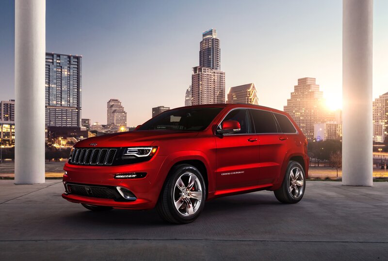 Red Jeep Grand Cherokee in city