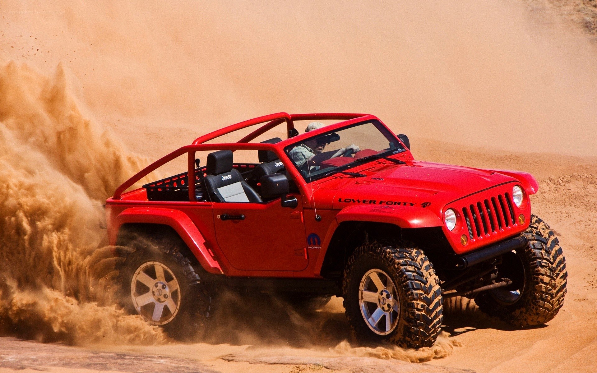 Red Jeep in Sand Dunes