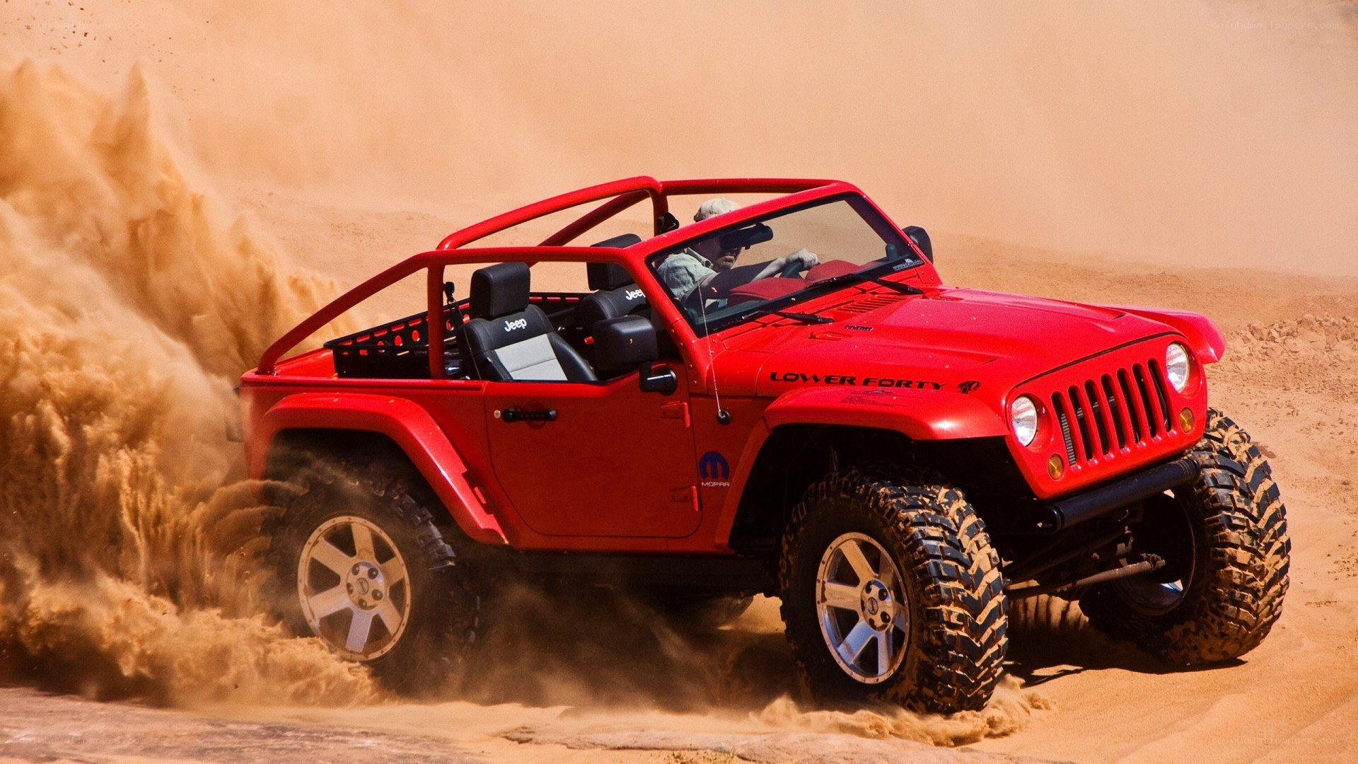 Red Jeep in Sand Dunes