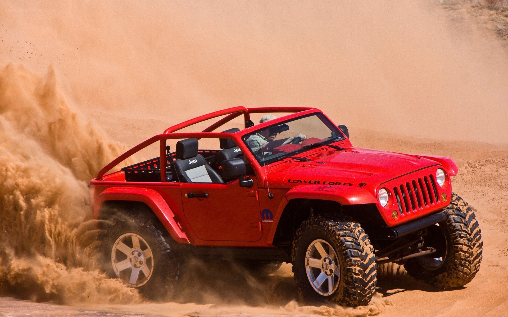 Red Jeep in Sand Dunes