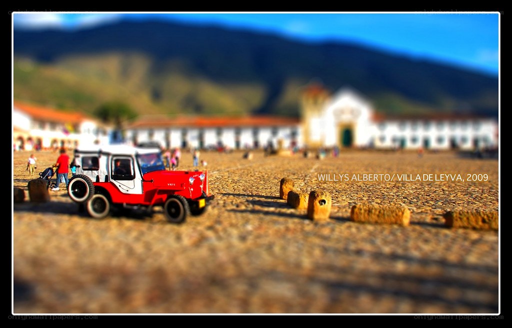 Red jeep in town square