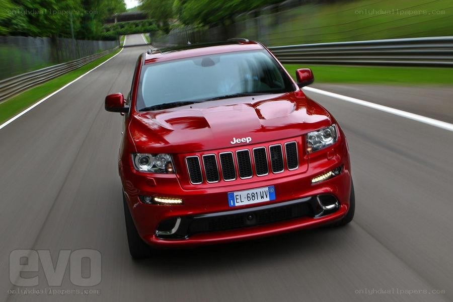 Red Jeep on a racetrack